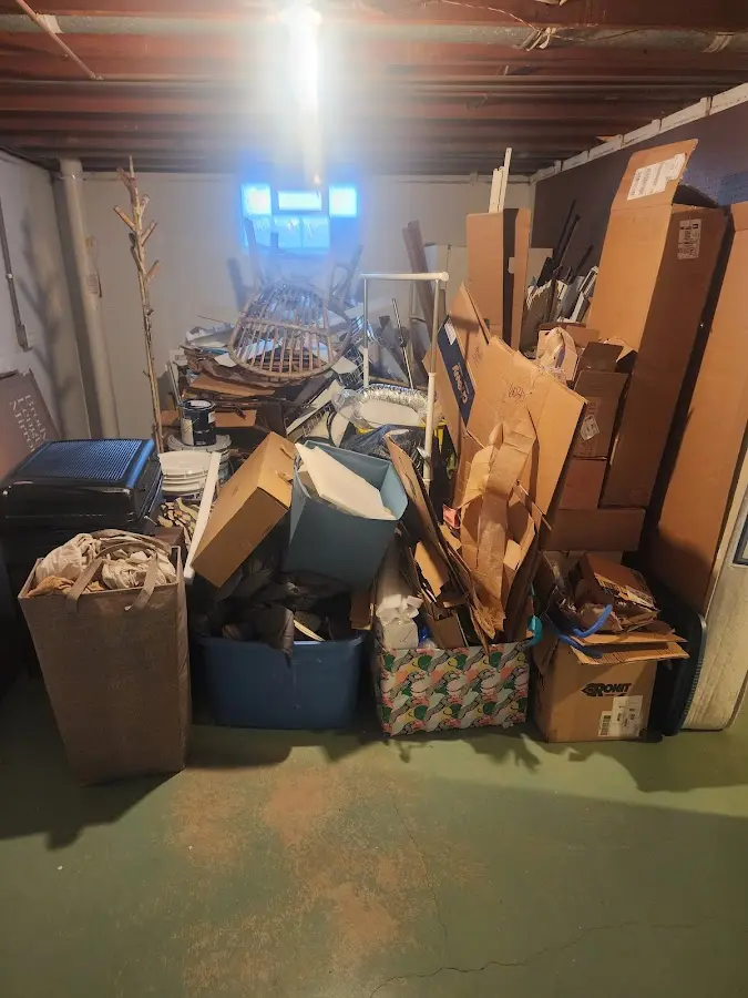 Roll-off dumpster container at job site for 4 Yard Dumpster Rental in Dorr